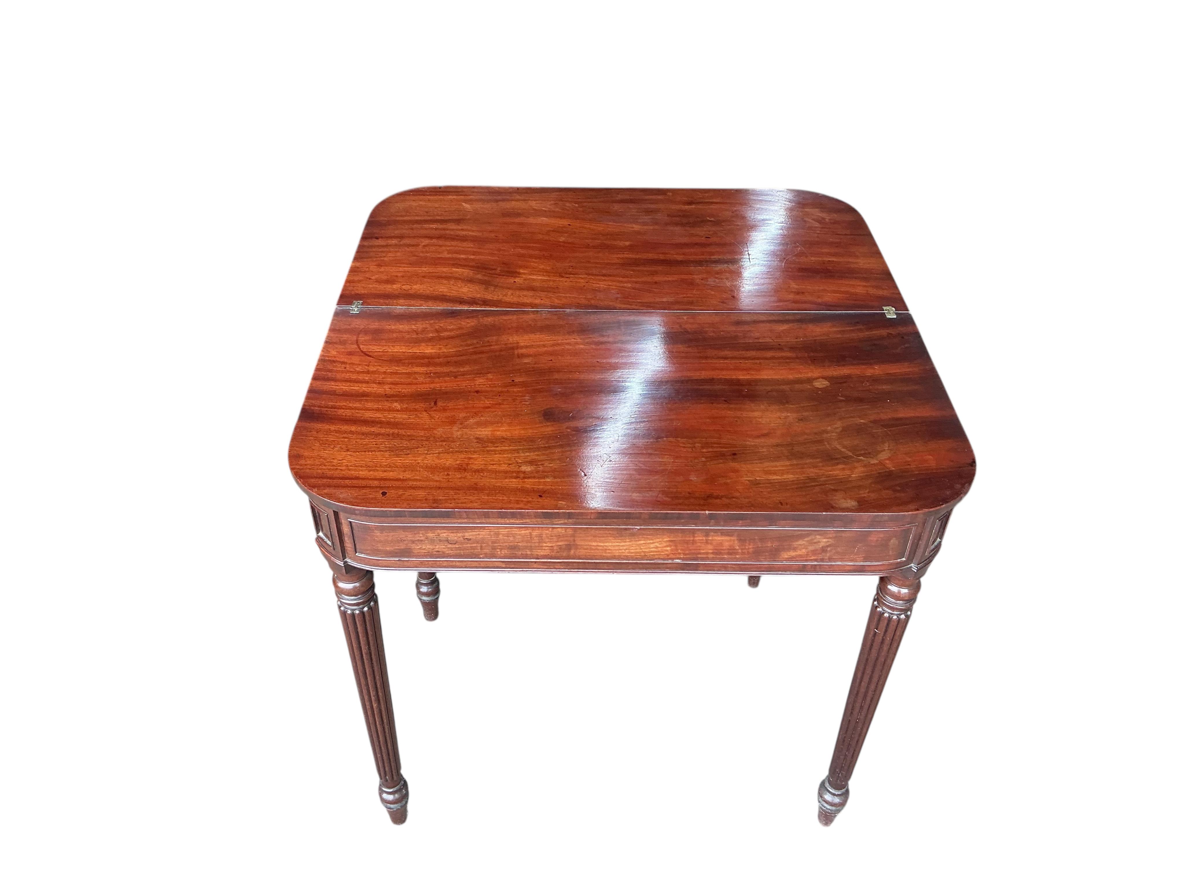 A Regency mahogany D-shaped folding tea table, width 76cm, depth 38cm, height 74cm